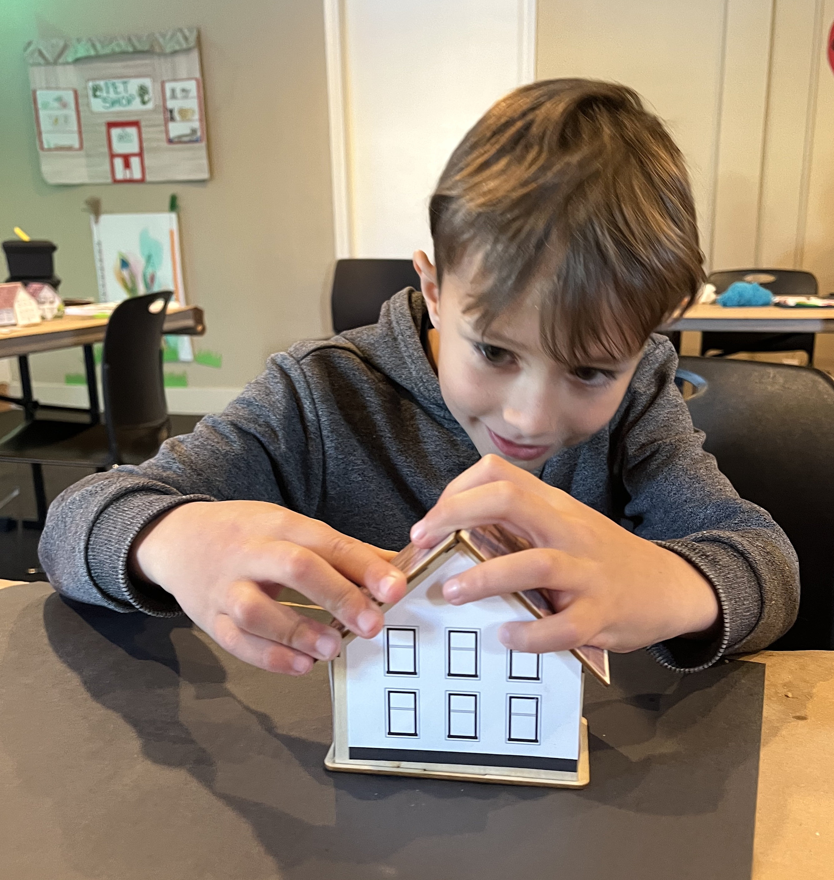 Assembling Miss Enders' tract homes -  LitWits Workshops - fun reading activities for teaching HOMER PRICE by Robert McCloskey