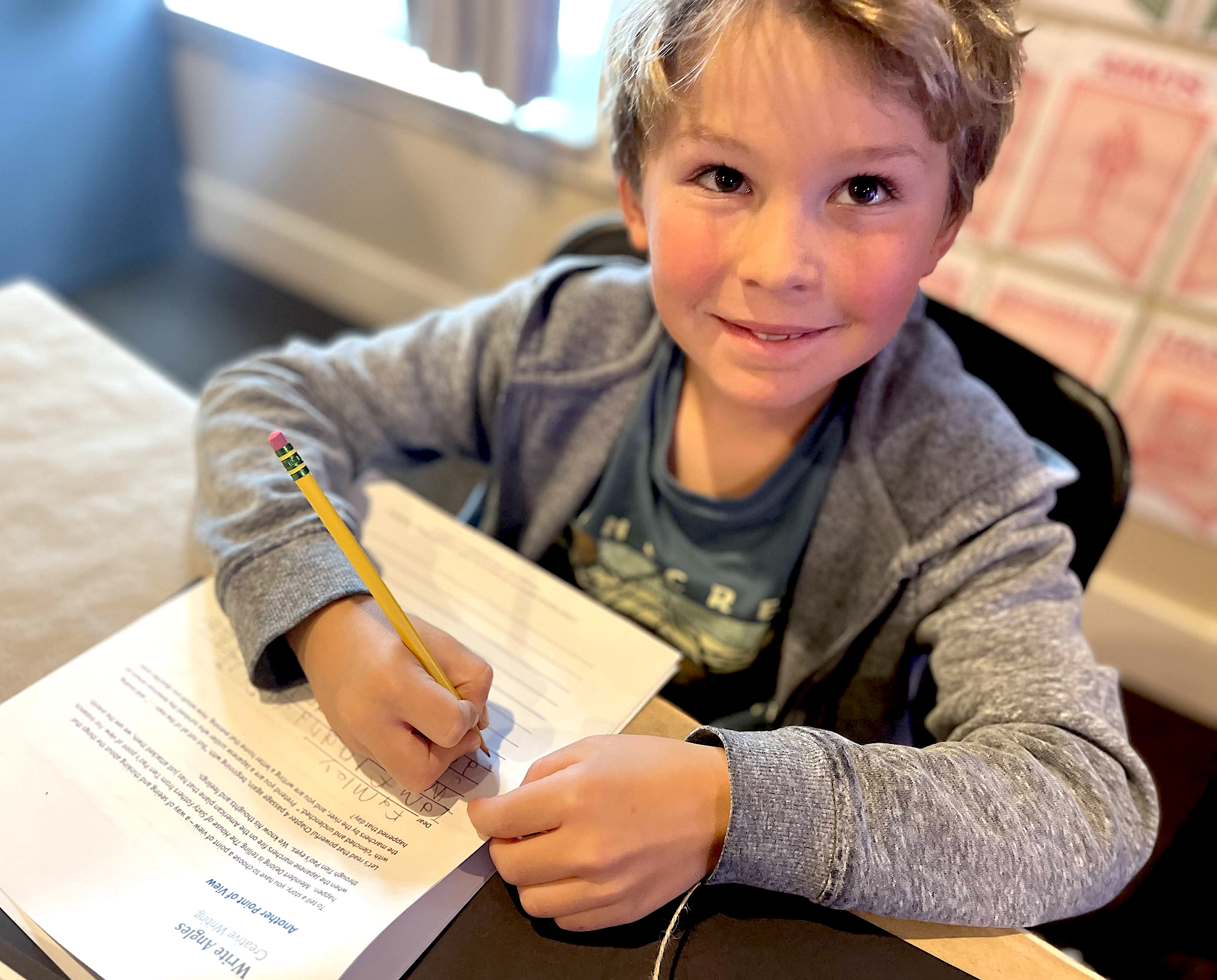 Child doing a creative writing activity - THE PHANTOM TOLLBOOTH by Norton Juster - from LitWits Workshops